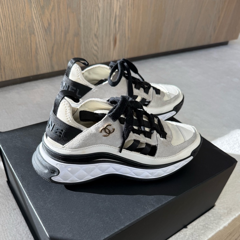 CHANEL Classic Sneakers in Ivory/White
Calfskin Suede + Gold Chanel Logo - Picture 5 of 9